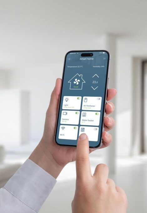 person-controls-the-temperature-and-lighting-in-the-house-with-the-help-of-an-app-on-a-mobile-phone-a-modern-smart-home-application-with-the-most-important-smart-controls-photo